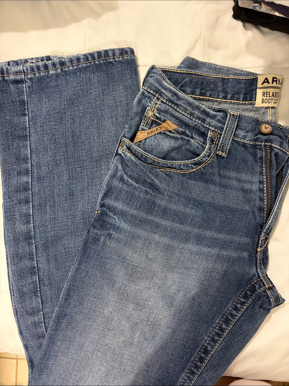 Ariat men Boot Cut Jeans in Medium Blue Wash